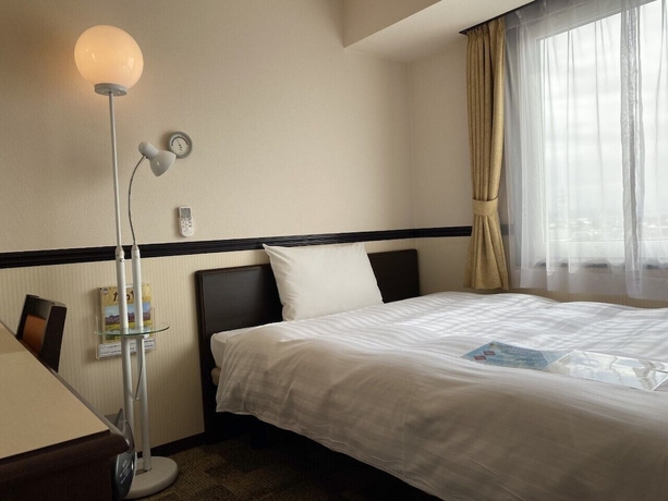 Imagen de la habitación del Hotel Toyoko Inn Shin Takaoka Station Shinkansen Minami. Foto 17