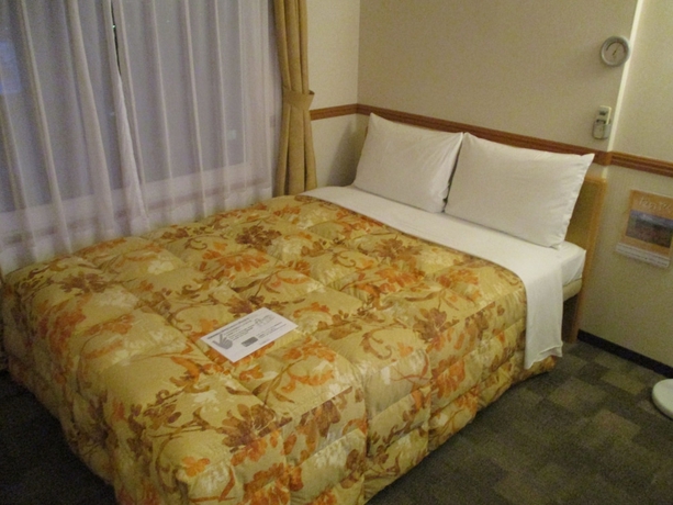 Imagen de la habitación del Hotel Toyoko Inn Shin Yatsushiro Station. Foto 8