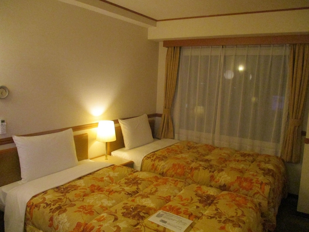 Imagen de la habitación del Hotel Toyoko Inn Shin Yatsushiro Station. Foto 12