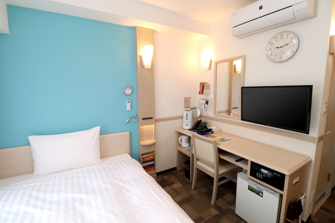 Imagen de la habitación del Hotel Toyoko Inn Shinjuku Gyoemmae Station. Foto 2