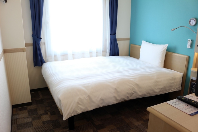 Imagen de la habitación del Hotel Toyoko Inn Shinjuku Gyoemmae Station. Foto 3