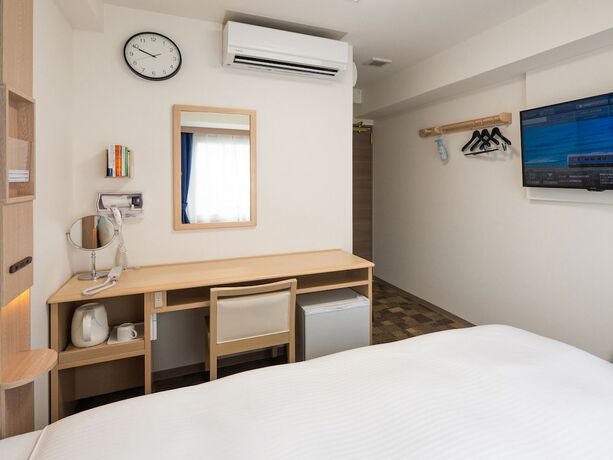 Imagen de la habitación del Hotel Toyoko Inn Tenri Ekimae. Foto 11