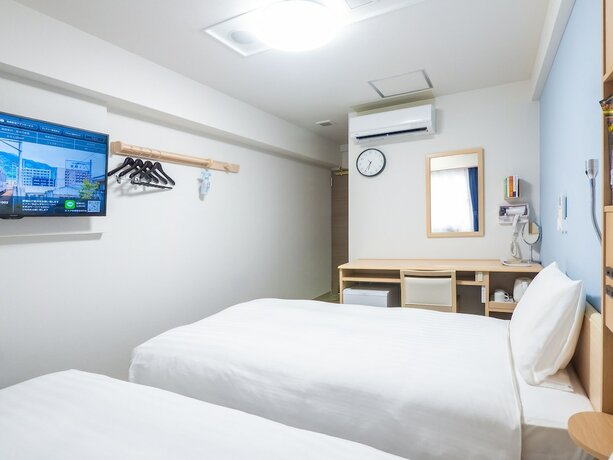 Imagen de la habitación del Hotel Toyoko Inn Tenri Ekimae. Foto 12