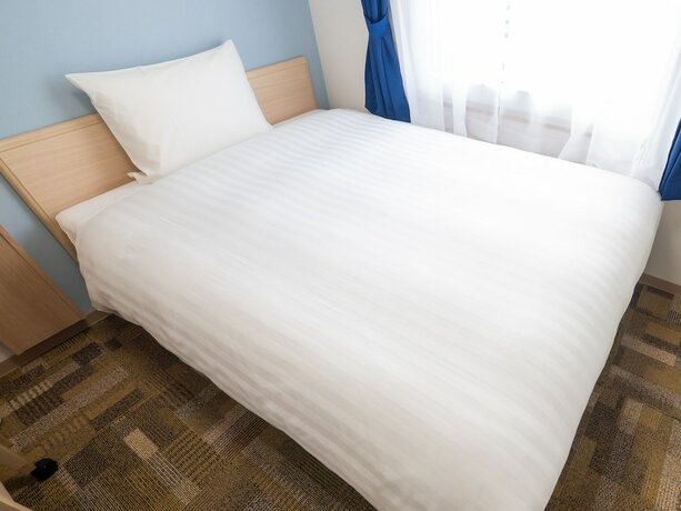 Imagen de la habitación del Hotel Toyoko Inn Tenri Ekimae. Foto 19