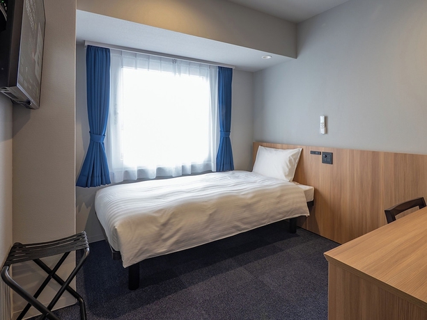 Imagen de la habitación del Hotel Toyoko Inn Tokorozawa-eki Nishi-guchi. Foto 11