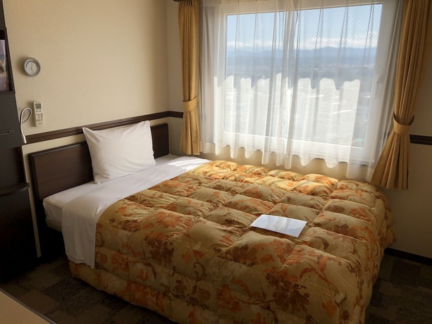 Imagen de la habitación del Hotel Toyoko Inn Tokyo Fussa Station Higashi. Foto 2
