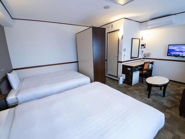 Imagen de la habitación del Hotel Toyoko Inn Tokyo Tachikawa Station Kita. Foto 13