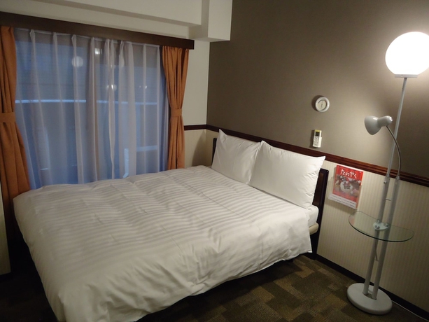 Imagen de la habitación del Hotel Toyoko Inn Tsudanuma Station Kita. Foto 2