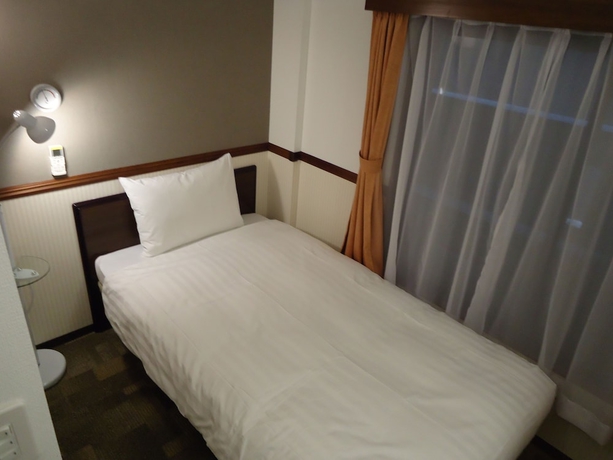 Imagen de la habitación del Hotel Toyoko Inn Tsudanuma Station Kita. Foto 6