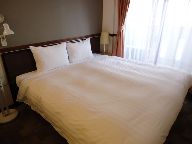 Imagen de la habitación del Hotel Toyoko Inn Tsudanuma Station Kita. Foto 8