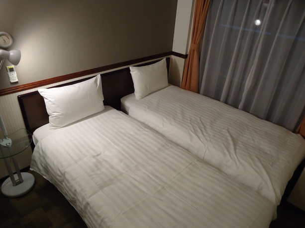 Imagen de la habitación del Hotel Toyoko Inn Tsudanuma Station Kita. Foto 12