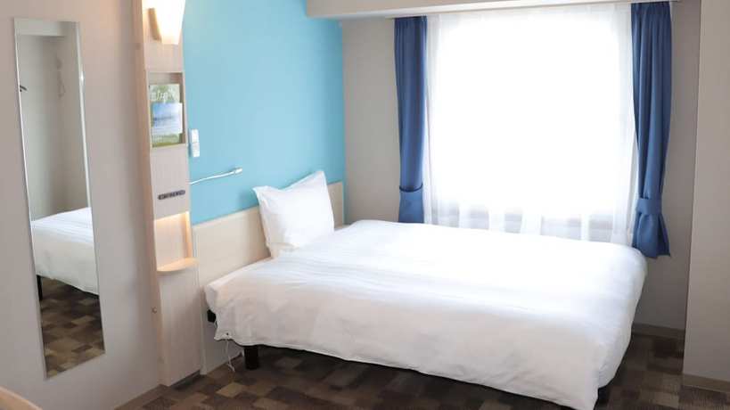 Imagen de la habitación del Hotel Toyoko Inn Yokohama Shiei-chikatetsu Center Minami-eki. Foto 14