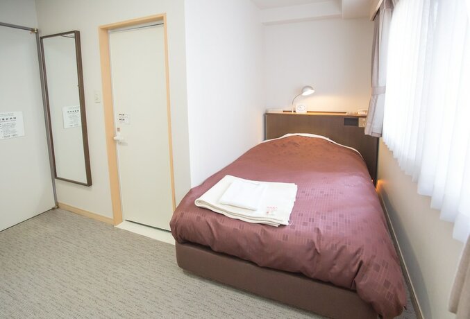 Imagen de la habitación del Hotel Toyota Prestige. Foto 9