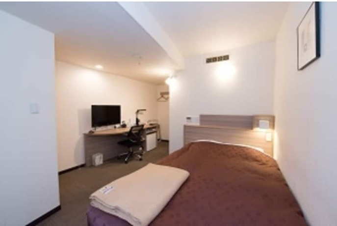 Imagen de la habitación del Hotel Toyota Prestige. Foto 10