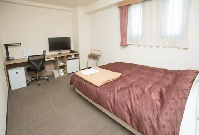 Imagen de la habitación del Hotel Toyota Prestige. Foto 11