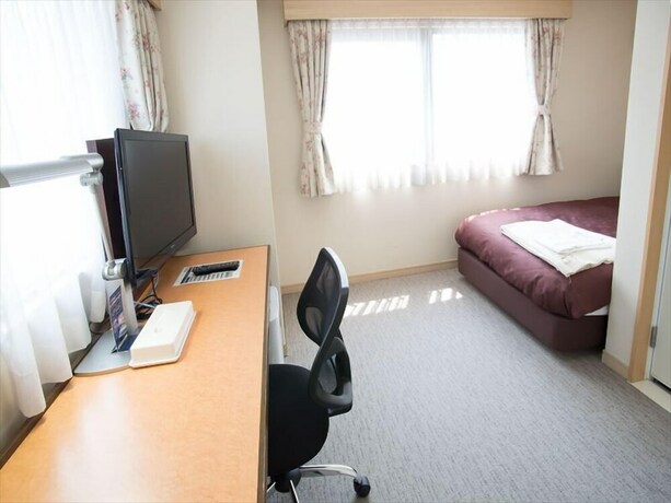 Imagen de la habitación del Hotel Toyota Prestige. Foto 12