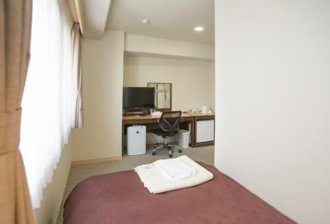 Imagen de la habitación del Hotel Toyota Prestige. Foto 14