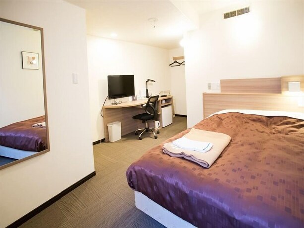 Imagen de la habitación del Hotel Toyota Prestige. Foto 16