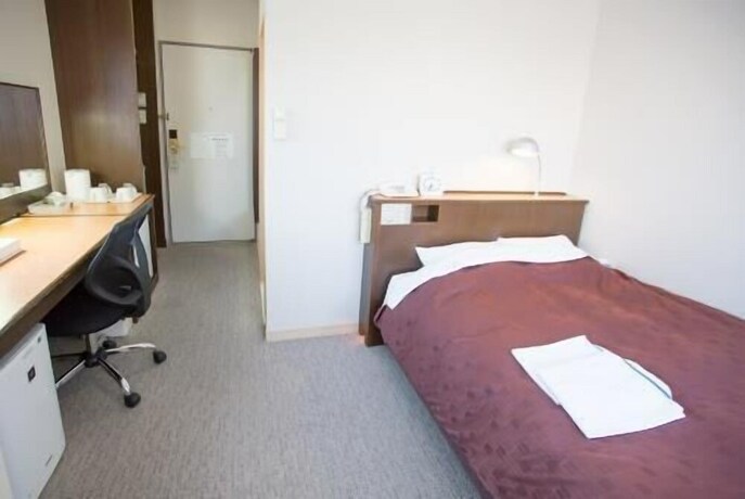 Imagen de la habitación del Hotel Toyota Prestige. Foto 17