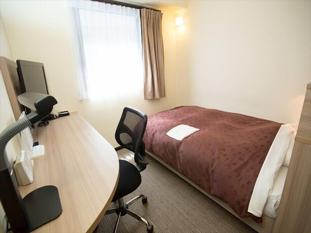 Imagen de la habitación del Hotel Toyota Prestige. Foto 18