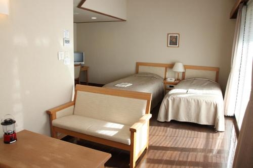 Imagen de la habitación del Hotel Toyota Shirakawa-go Eco-institute. Foto 6