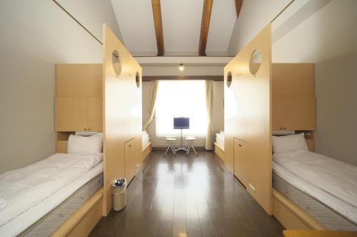 Imagen de la habitación del Hotel Toyota Shirakawa-go Eco-institute. Foto 8