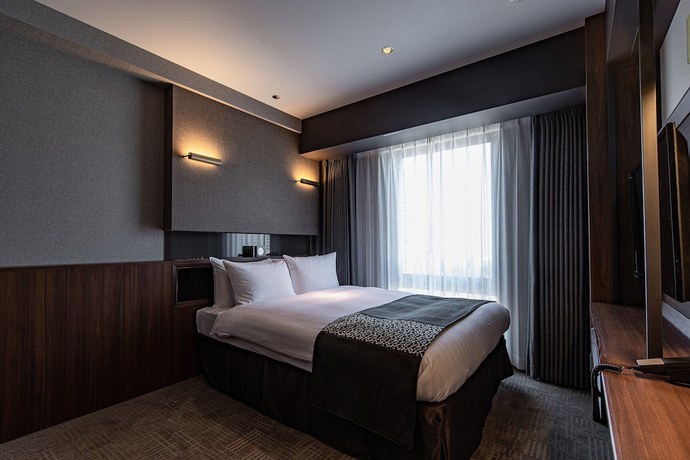 Imagen de la habitación del Hotel Trad Hakata. Foto 11