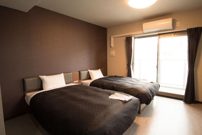 Imagen de la habitación del Hotel Trad Osaka Tsuruhashi. Foto 13