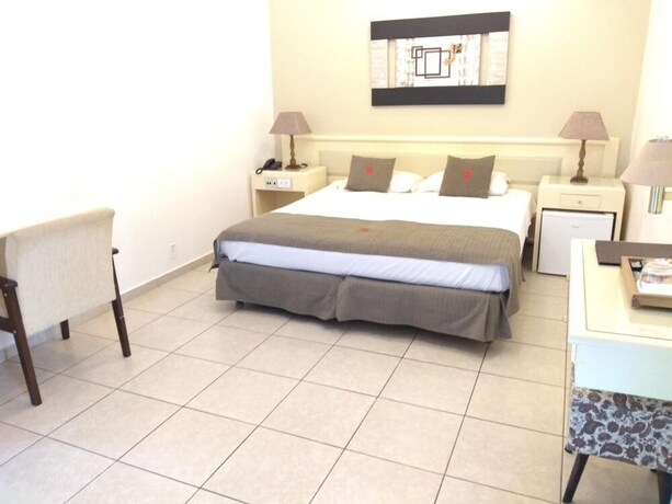 Imagen de la habitación del Hotel Trade Garden. Foto 23