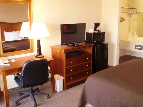 Imagen de la habitación del Hotel Trade Winds Central Inn. Foto 4