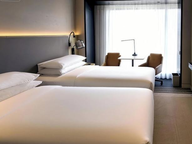 Imagen de la habitación del Hotel Traders Hongqiao Airport,Shanghai. Foto 10