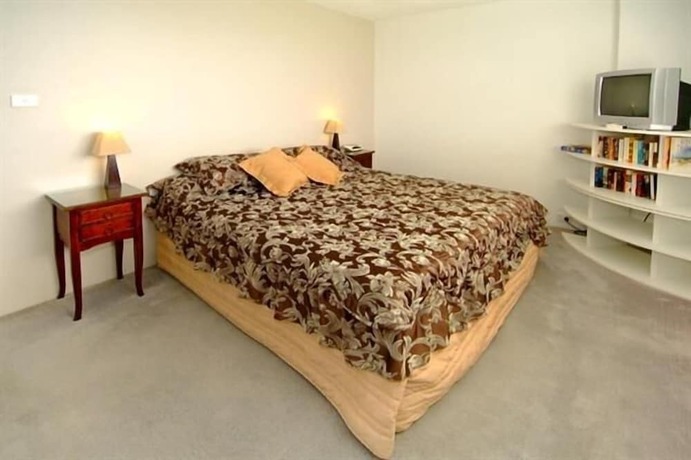 Imagen de la habitación del Hotel Tradewinds Apartments. Foto 26