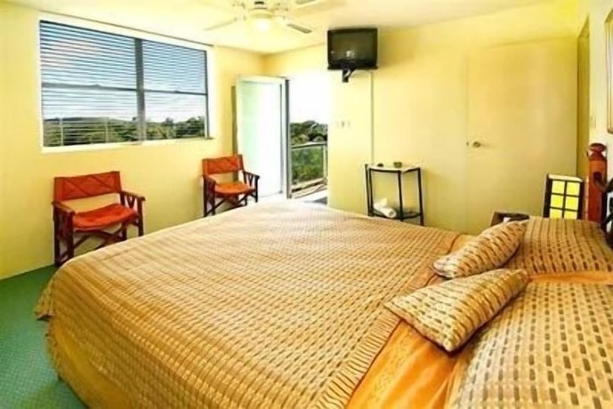 Imagen de la habitación del Hotel Tradewinds Apartments. Foto 29