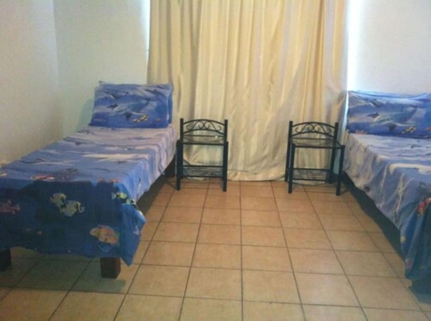 Imagen de la habitación del Hotel Tradewinds Villas. Foto 8