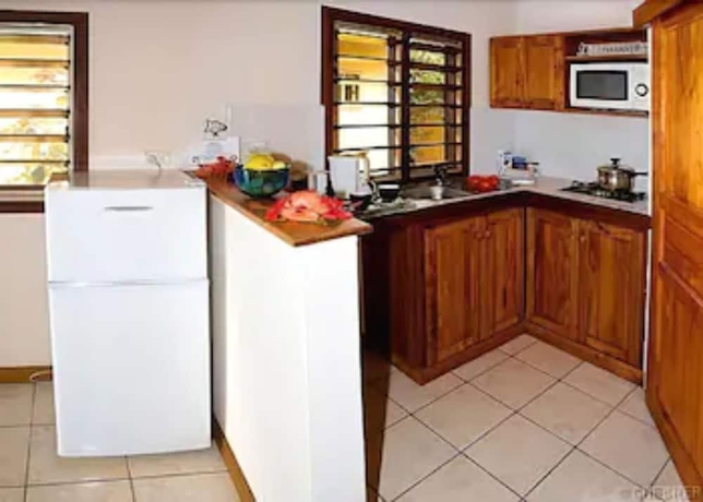 Imagen de la habitación del Hotel Tradewinds Villas. Foto 11