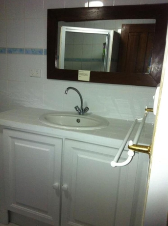 Imagen de la habitación del Hotel Tradewinds Villas. Foto 15