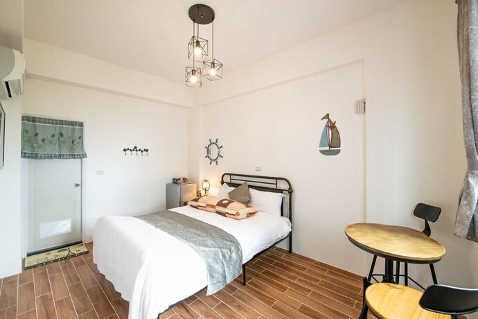 Imagen de la habitación del Hotel Traditional Arts Country Inn. Foto 14