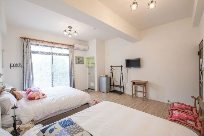 Imagen de la habitación del Hotel Traditional Arts Country Inn. Foto 16