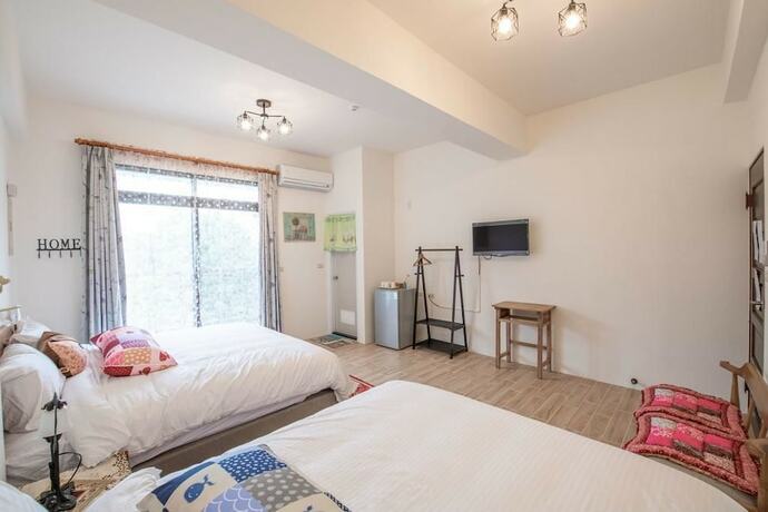 Imagen de la habitación del Hotel Traditional Arts Country Inn. Foto 17