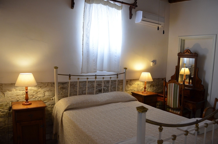 Imagen de la habitación del Hotel Traditional Village Houses. Foto 5