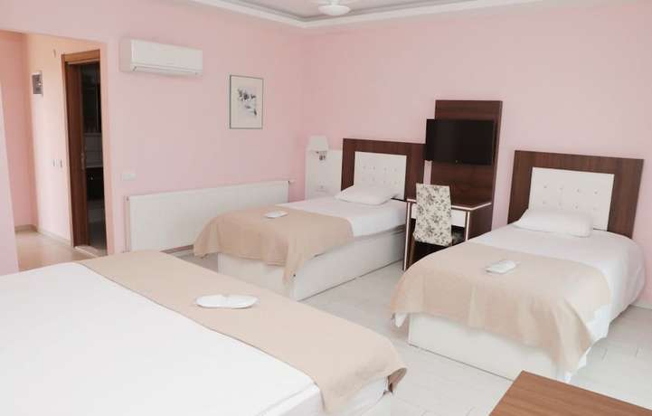 Imagen de la habitación del Hotel Tralles. Foto 12