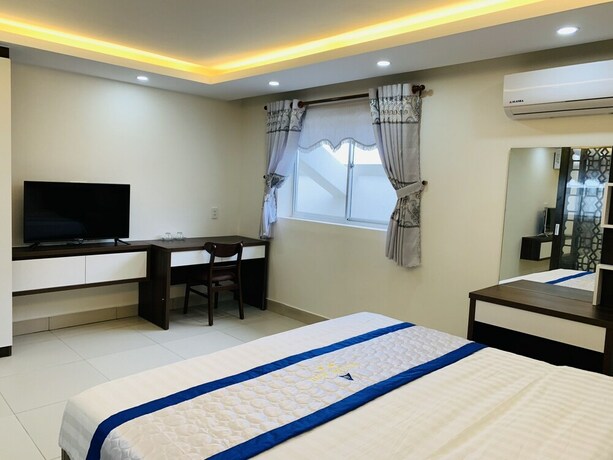 Imagen de la habitación del Hotel Tran Long Binh Duong Hotel. Foto 2