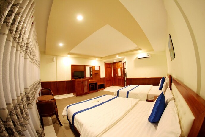 Imagen de la habitación del Hotel Tran Long Binh Duong Hotel. Foto 3