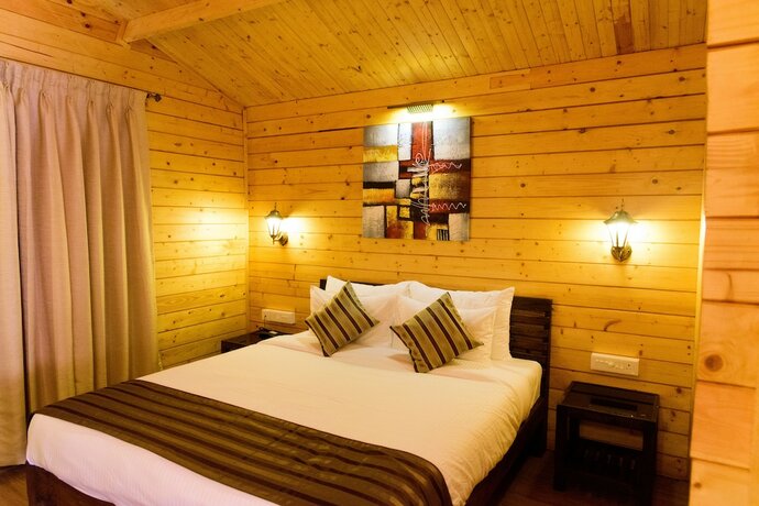 Imagen de la habitación del Hotel Tranquility Cottage Resort. Foto 19