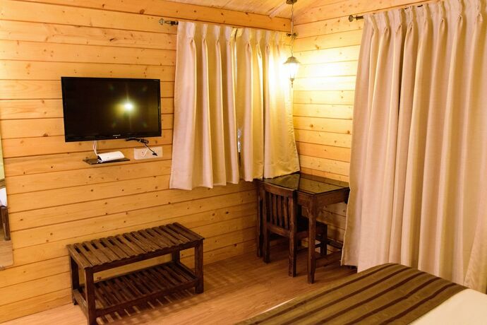 Imagen de la habitación del Hotel Tranquility Cottage Resort. Foto 20