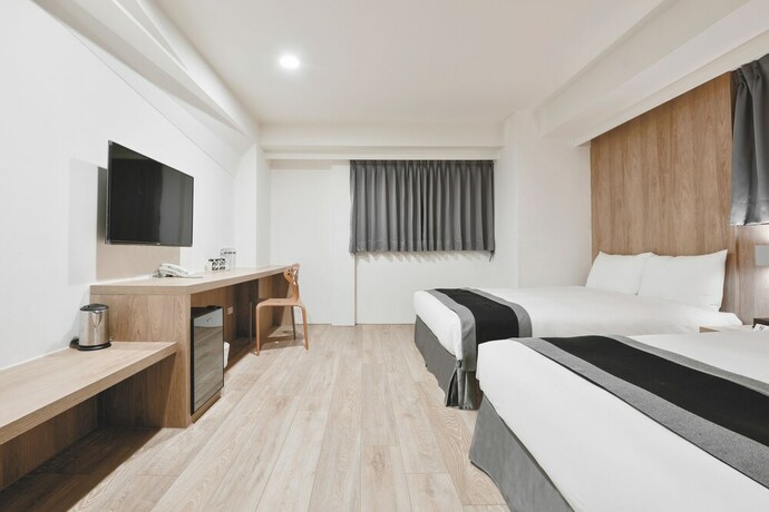 Imagen de la habitación del Hotel Trans Inn. Foto 19
