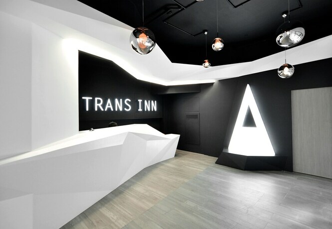 Imagen de los interiores del Hotel Trans Inn. Foto 33