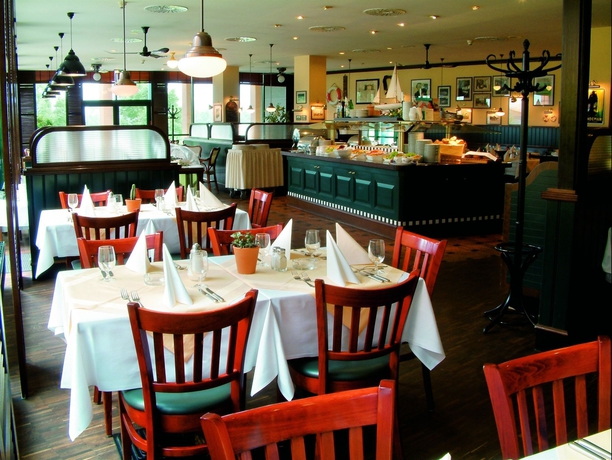 Imagen del bar/restaurante del Hotel Trans World Donauwelle. Foto 6