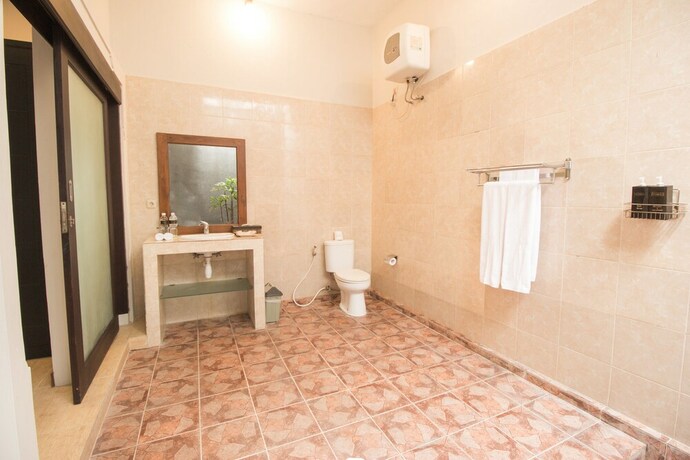 Imagen de la habitación del Hotel Transera Kirana Villa Seminyak. Foto 24