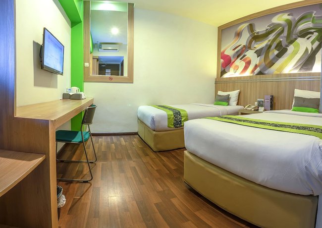 Imagen de la habitación del Hotel Transera Pontianak. Foto 12